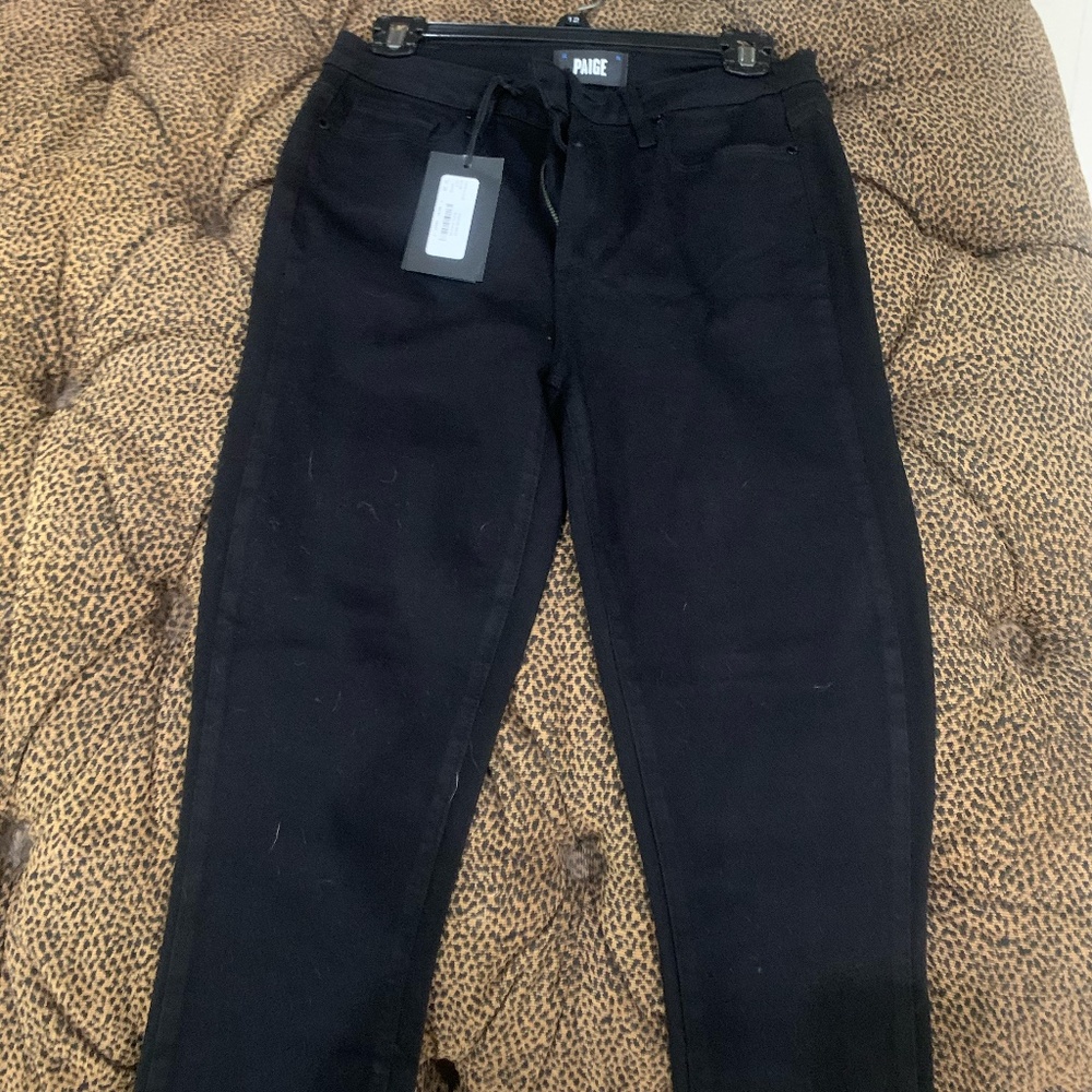 Black skinny jeans, never worn with tags